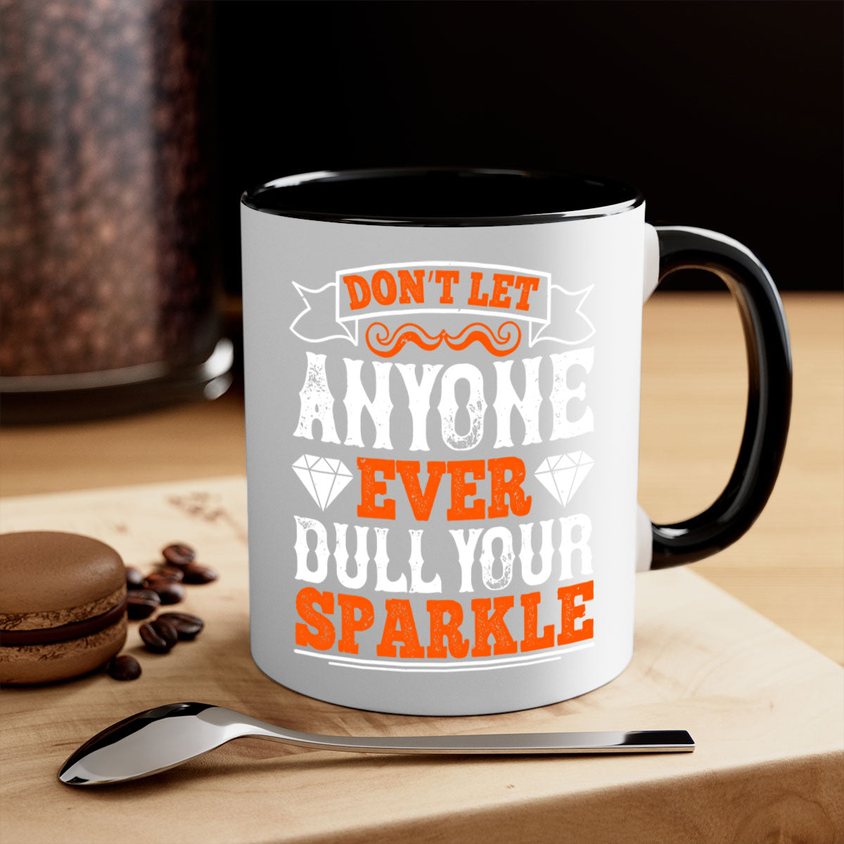 A vibrant two-tone coffee mug with the phrase 'Don’t let anyone ever dull your sparkle' printed on it, featuring a colored handle and glossy finish.