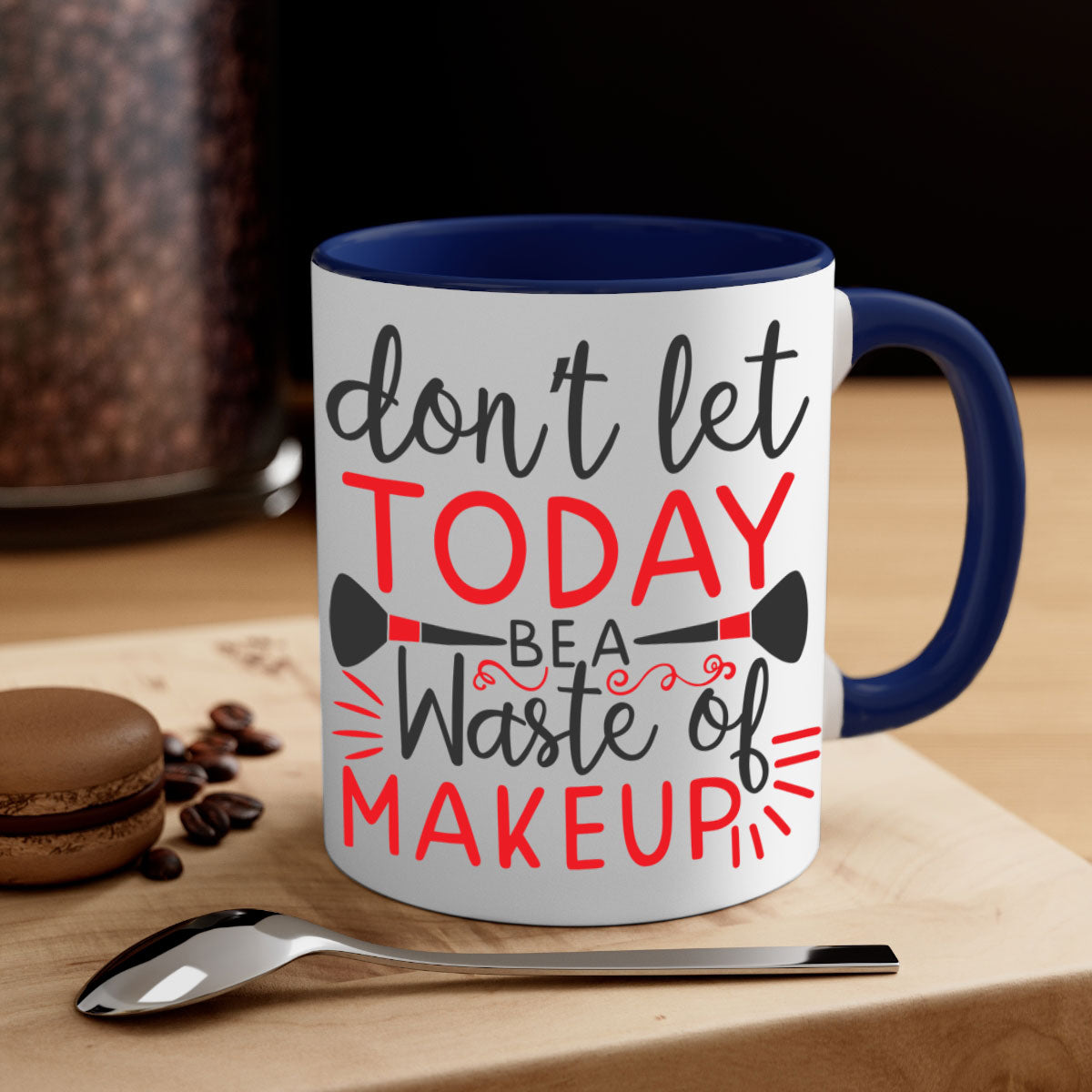 Stylish two-tone ceramic mug with colored handle and glossy finish, featuring the phrase 'don’t let today be a waste of makeup'.