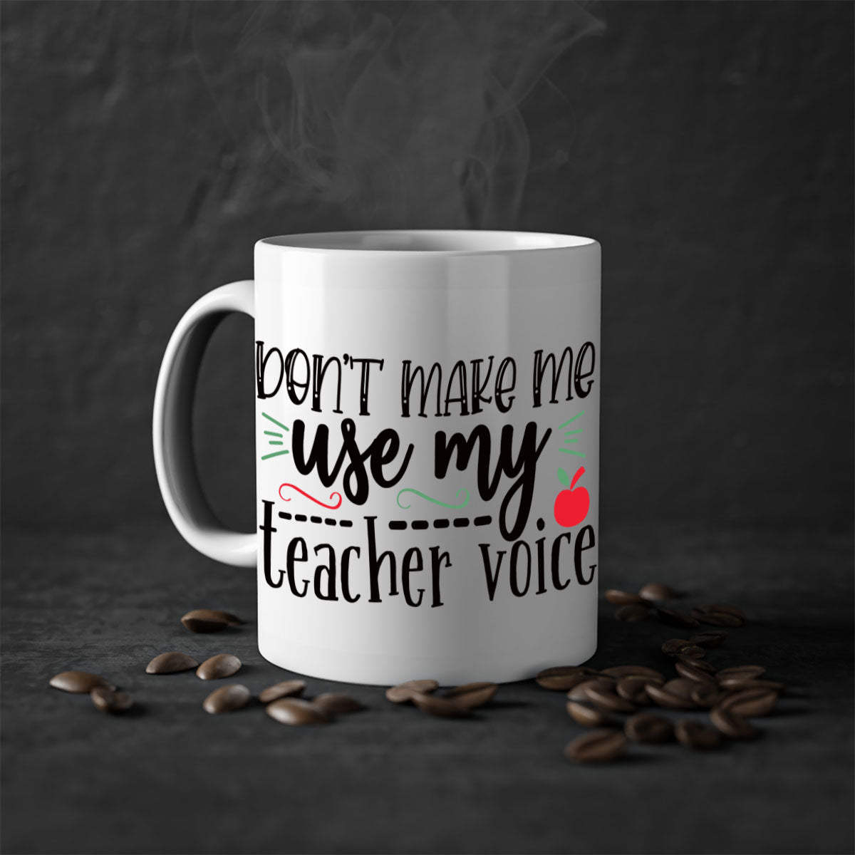 Two-tone ceramic coffee mug with 'Don't Make Me Use My Teacher Voice' text, featuring a colored handle and glossy finish.
