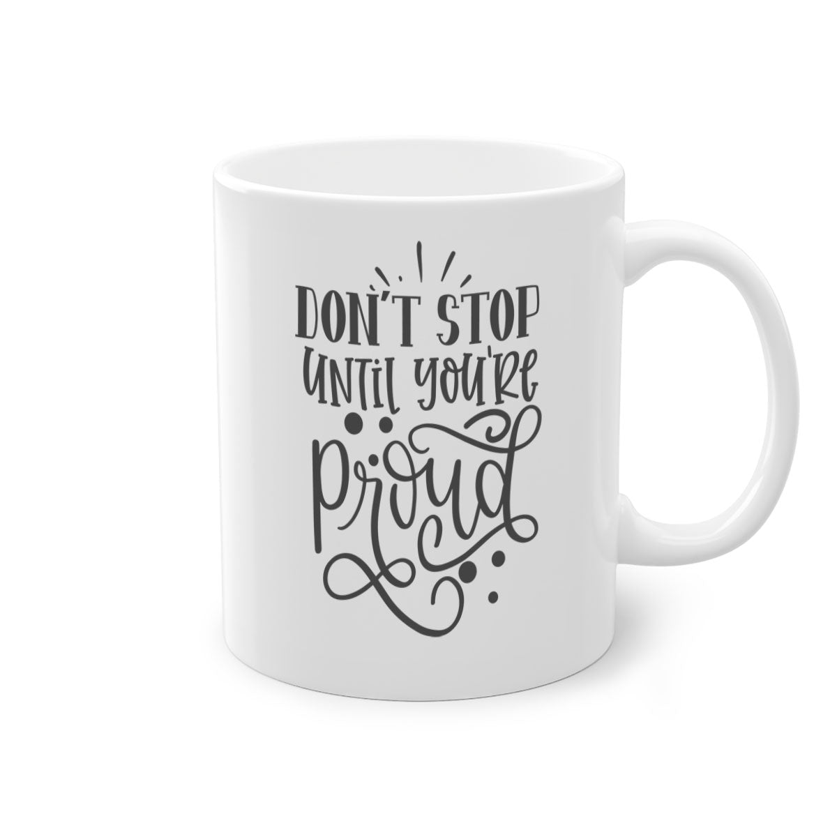 A stylish two-tone ceramic mug with a motivational quote 'Don't Stop Until You're Proud', featuring a colored handle and glossy finish.