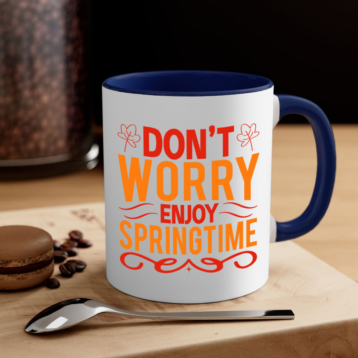 A two-tone ceramic coffee mug with a glossy finish, featuring a colored handle and interior, perfect for springtime beverages.