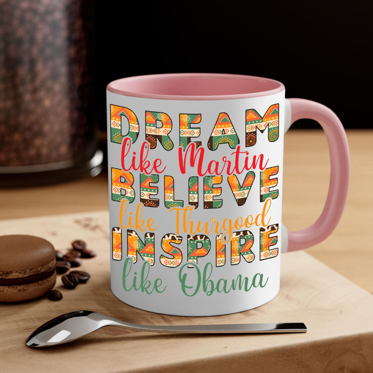 Dream Believe Inspire Juneteenth Mug with colorful handle and glossy finish, available in multiple sizes.