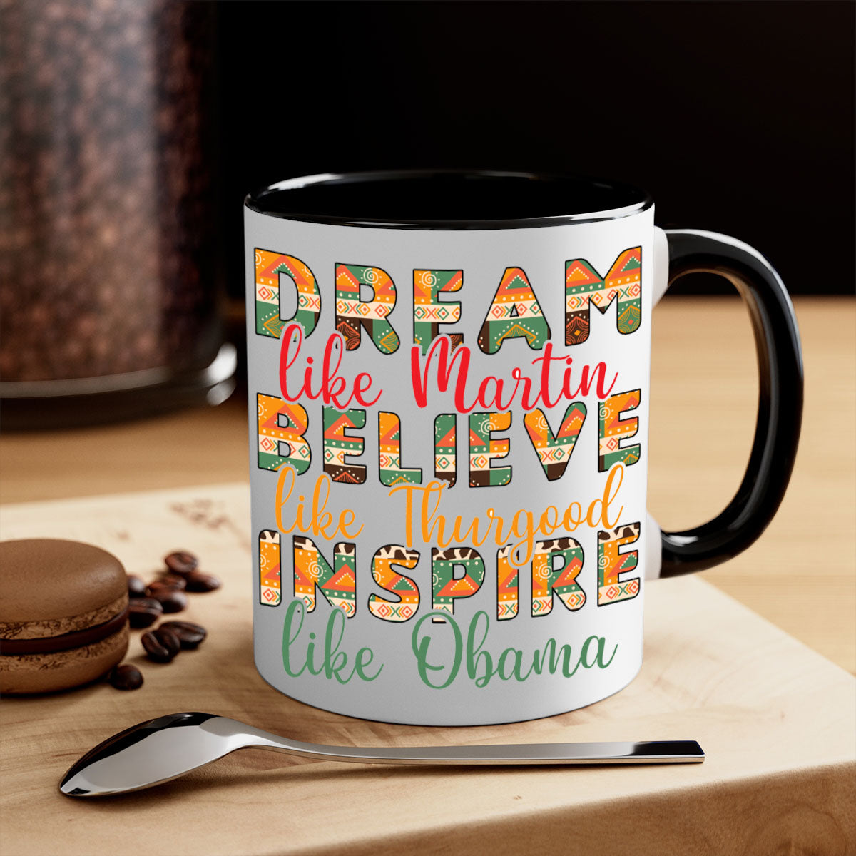 Dream Believe Inspire Juneteenth Mug with colorful handle and glossy finish, available in multiple sizes.