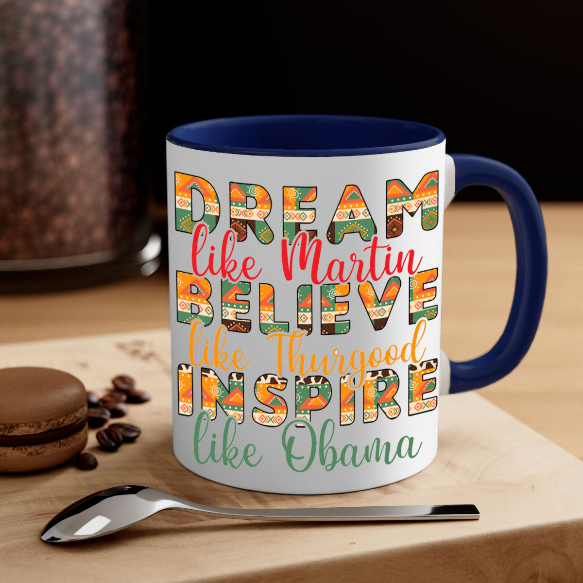 Dream Believe Inspire Juneteenth Mug with colorful handle and glossy finish, available in multiple sizes.