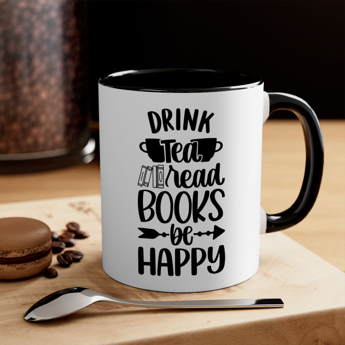 A stylish two-tone ceramic mug with a colored handle and interior, featuring the phrase 'drink tea read books be happy'.