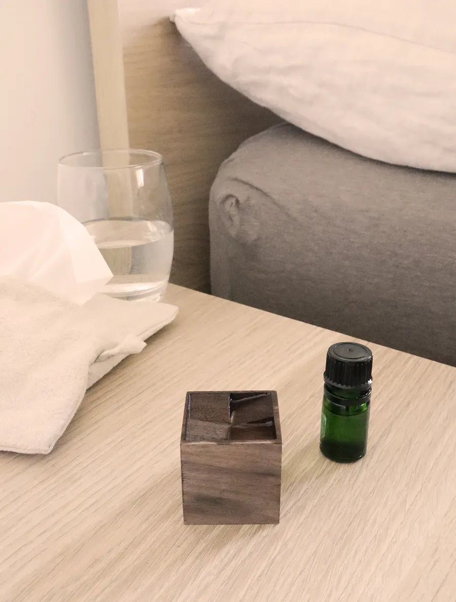 Echo Valley Wooden Essential Oil Diffuser, a pocket-sized artisan wood piece designed for natural aroma diffusion.