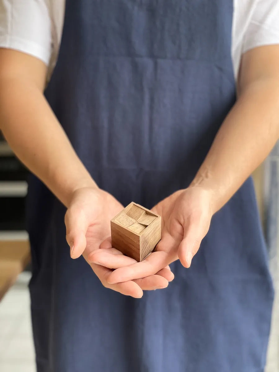 Echo Valley Wooden Essential Oil Diffuser, a pocket-sized artisan wood piece designed for natural aroma diffusion.