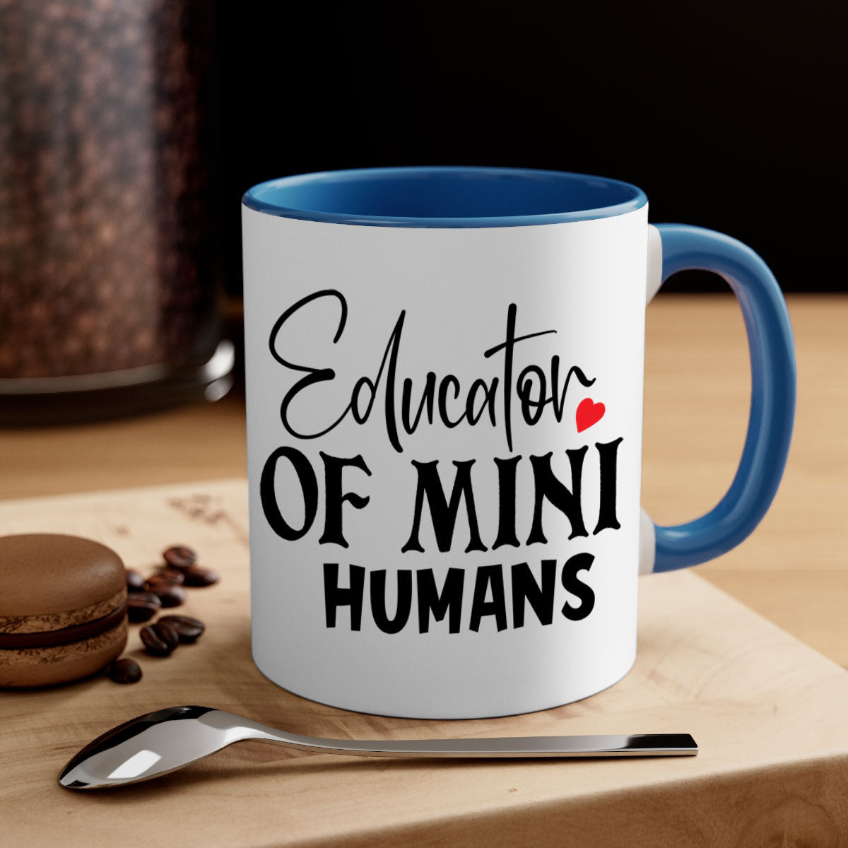 Educator of Mini Humans Style 180# Mug with a glossy finish, featuring a colored handle and interior, available in multiple colors.