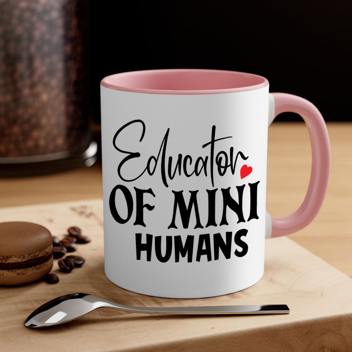 Educator of Mini Humans Style 180# Mug with a glossy finish, featuring a colored handle and interior, available in multiple colors.