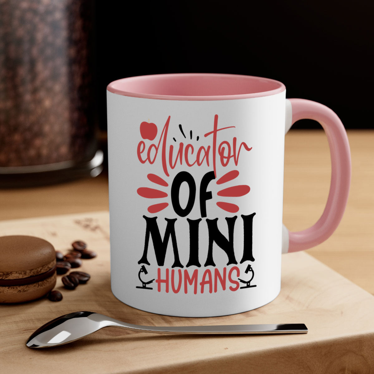 A stylish educator of mini humans mug with a glossy finish, featuring a colored handle and interior, available in five vibrant colors.