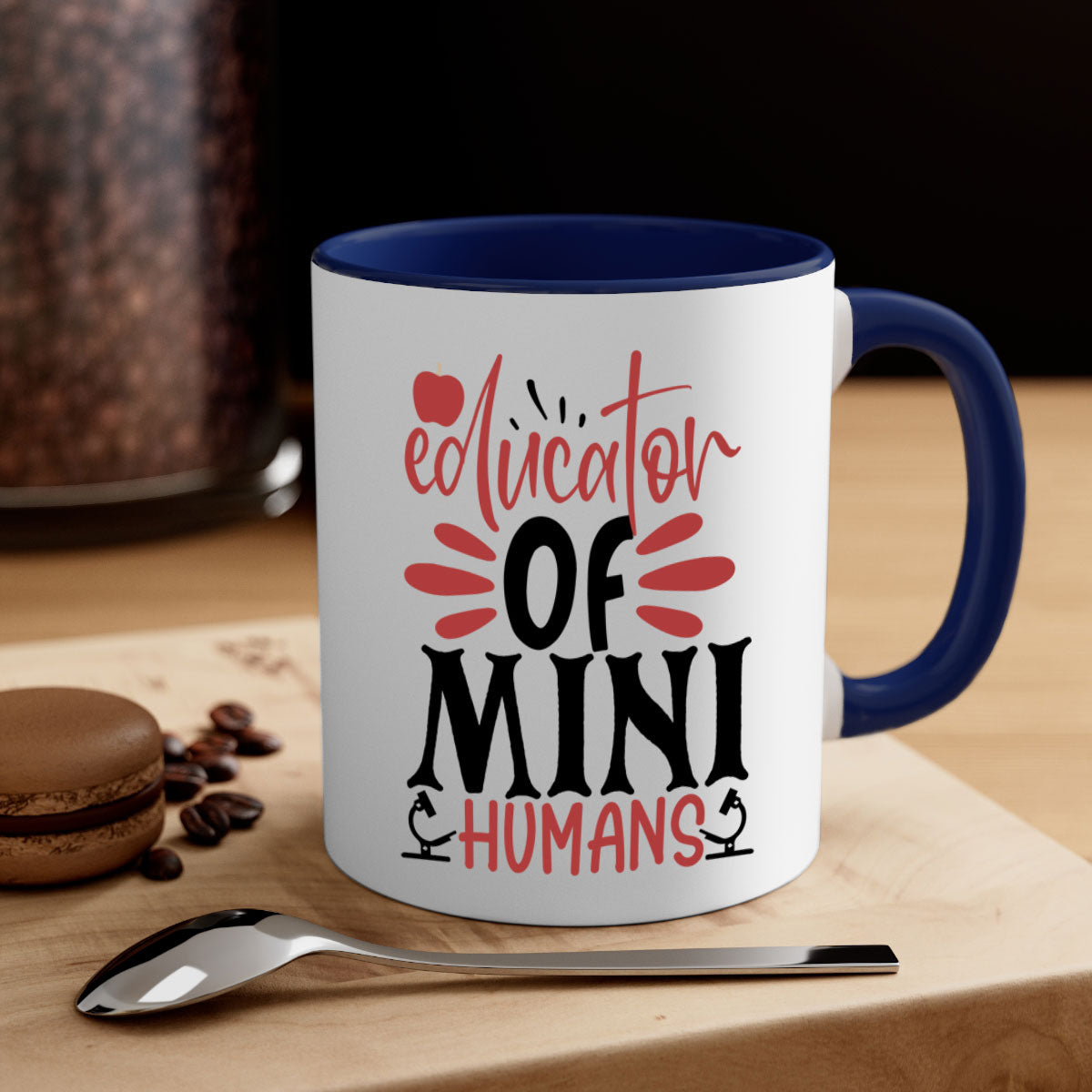 A stylish educator of mini humans mug with a glossy finish, featuring a colored handle and interior, available in five vibrant colors.