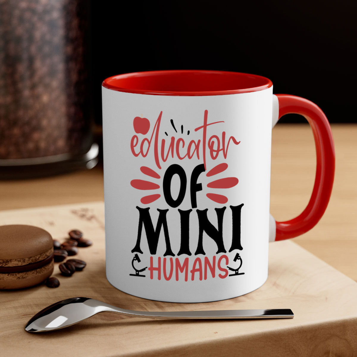 A stylish educator of mini humans mug with a glossy finish, featuring a colored handle and interior, available in five vibrant colors.