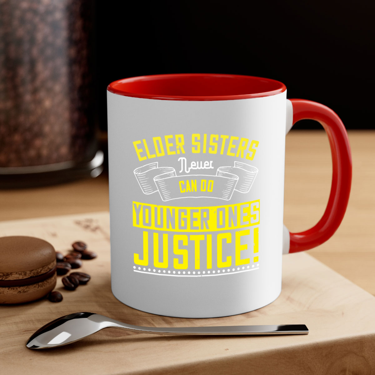 A stylish two-tone ceramic mug with a colored handle and interior, featuring the phrase 'elder sisters never can do younger ones justice' in a glossy finish.