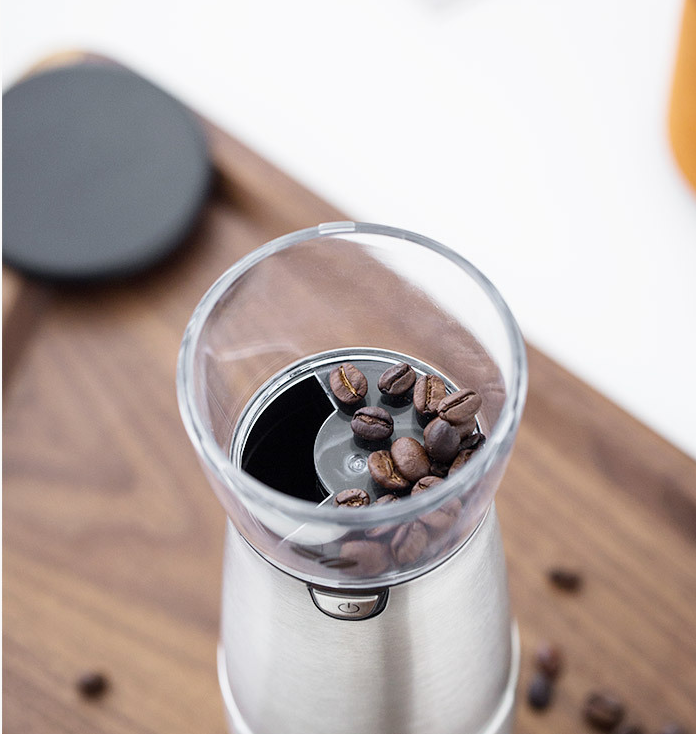 Electric Coffee Grinder made of stainless steel, featuring USB charging and a sleek design, ideal for grinding coffee beans and spices.