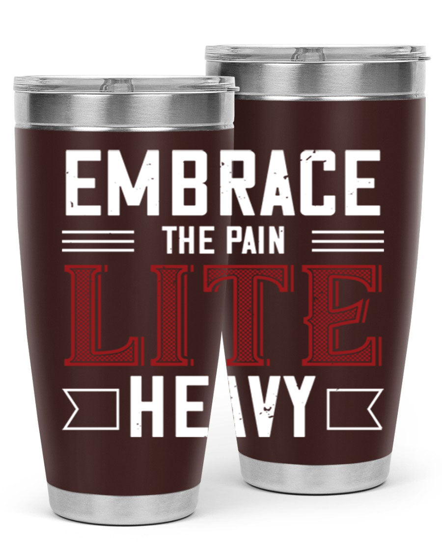 Embrace the Pain Lite Heavy 55# Gym Tumbler in stainless steel with a drink-thru lid, showcasing its sleek design and vibrant print.