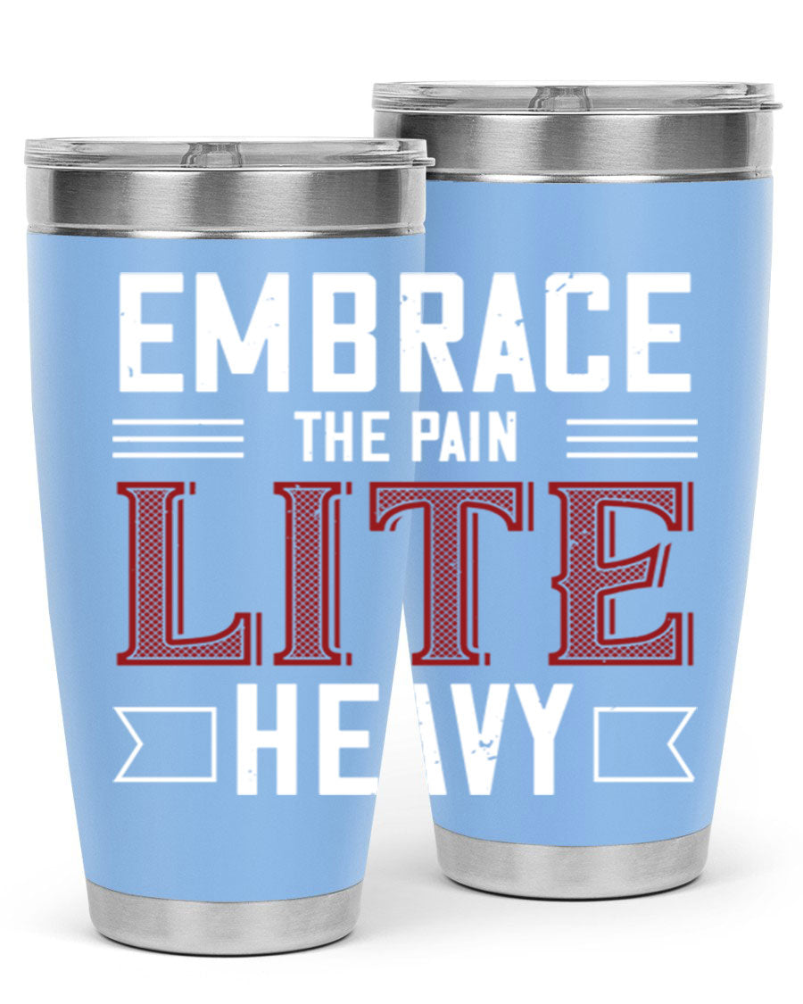 Embrace the Pain Lite Heavy 55# Gym Tumbler in stainless steel with a drink-thru lid, showcasing its sleek design and vibrant print.