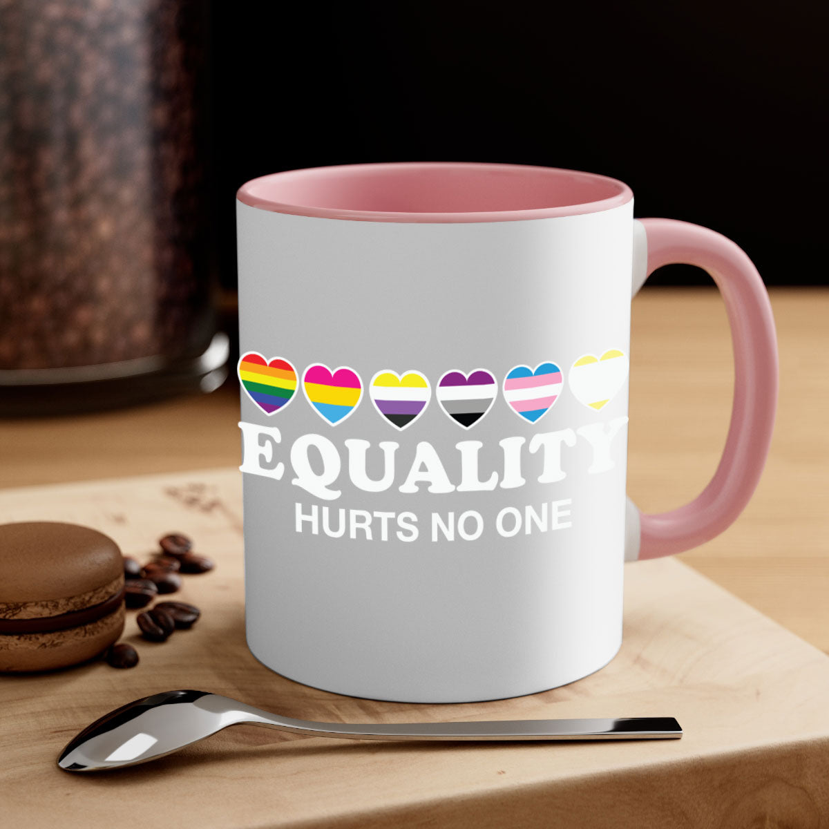 A stylish two-tone Equality Hurts No One LGBT Mug with a colored handle and glossy finish, available in multiple colors.