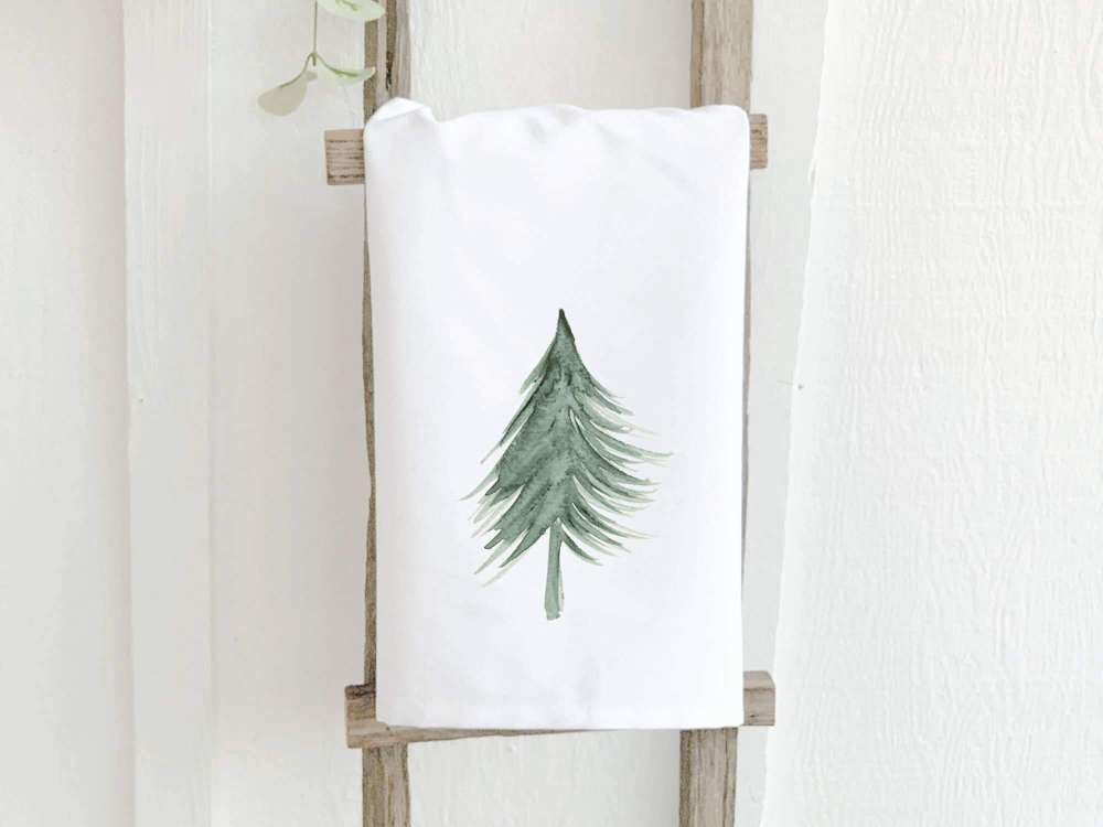 Evergreen Tree Cotton Tea Towel featuring a vibrant tree design on absorbent fabric, perfect for kitchen use.