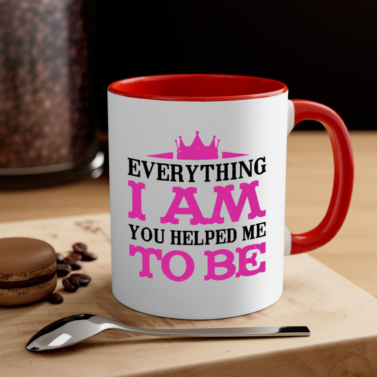 Ceramic coffee mug with colorful handle and interior, featuring the phrase 'Everything I Am You Helped Me to Be 85#' for Mother's Day.
