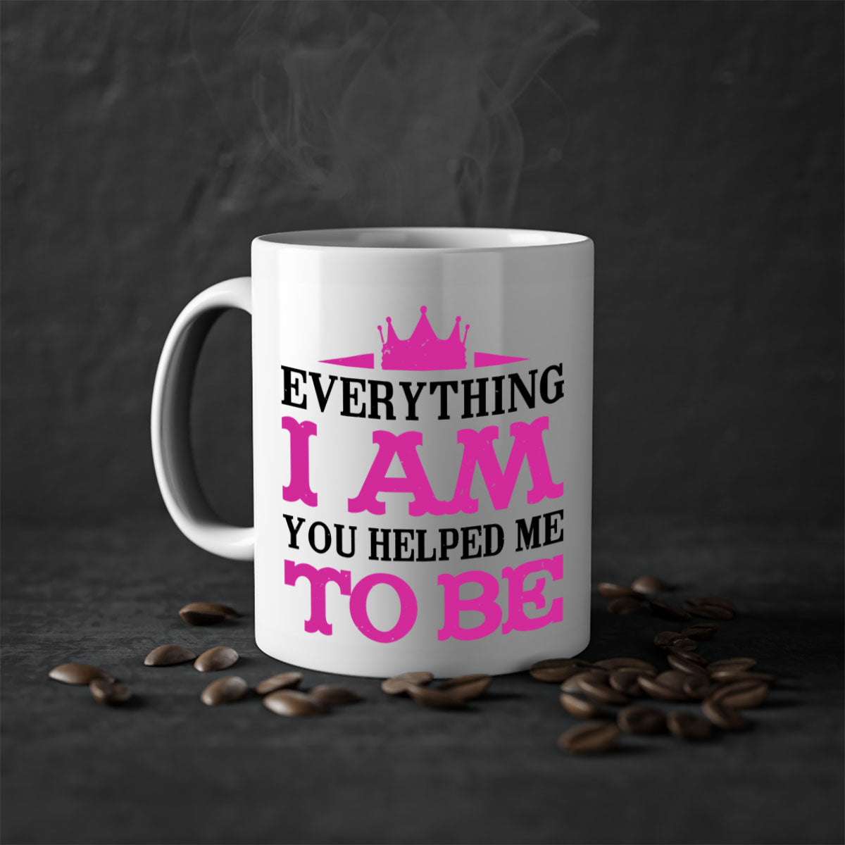 Ceramic coffee mug with colorful handle and interior, featuring the phrase 'Everything I Am You Helped Me to Be 85#' for Mother's Day.