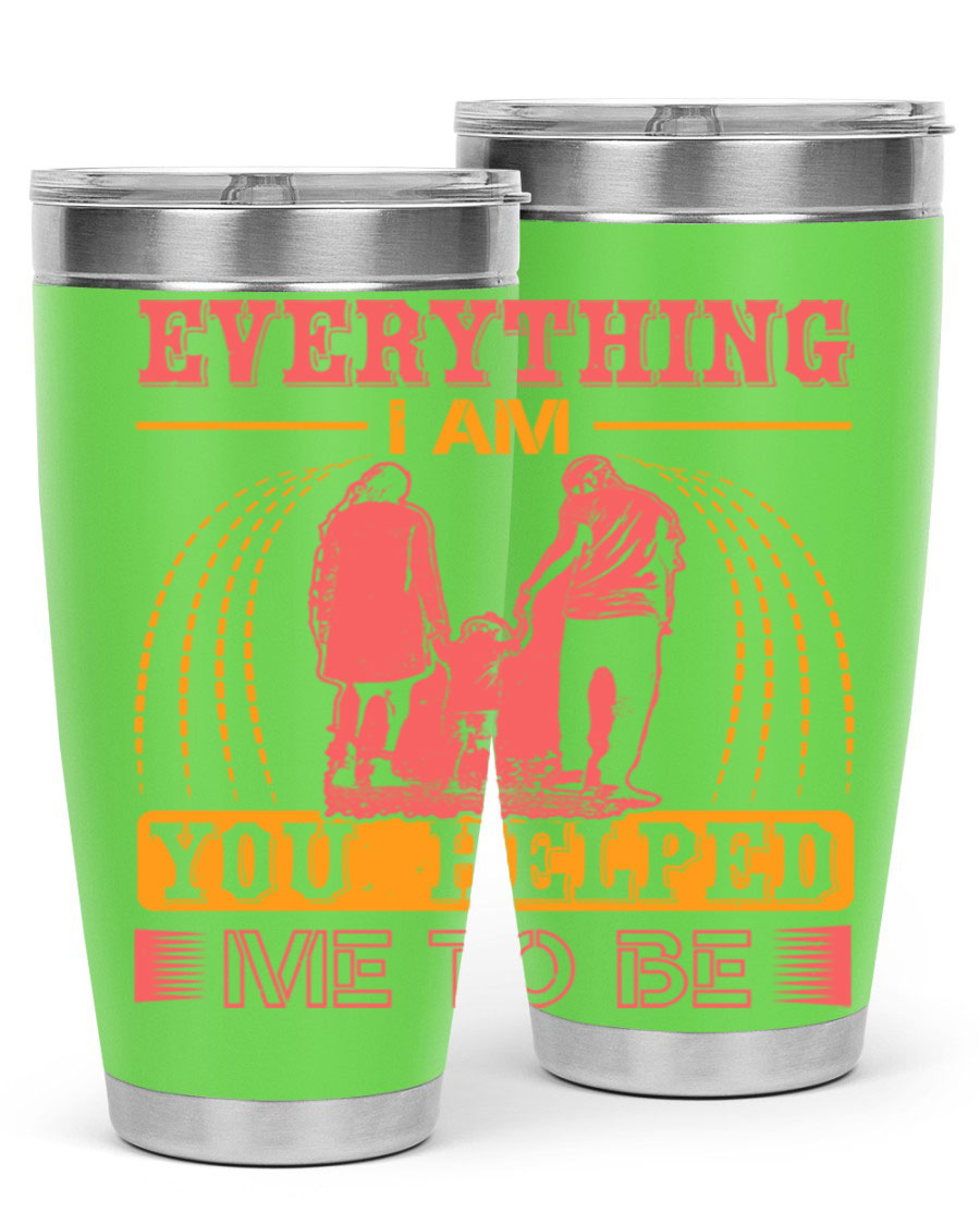 A stylish 20oz and 30oz stainless steel tumbler with the phrase 'Everything I Am, You Helped Me to Be' printed on it, showcasing its double wall vacuum design.