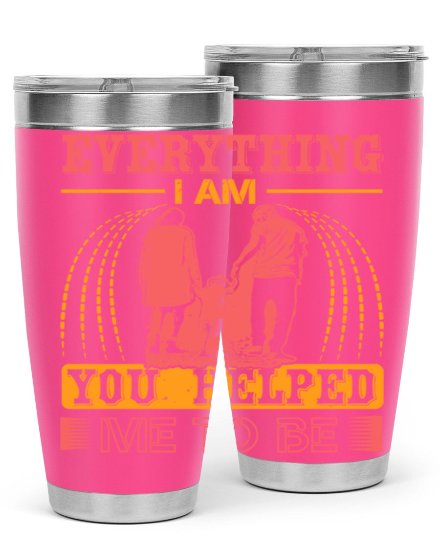 A stylish 20oz and 30oz stainless steel tumbler with the phrase 'Everything I Am, You Helped Me to Be' printed on it, showcasing its double wall vacuum design.
