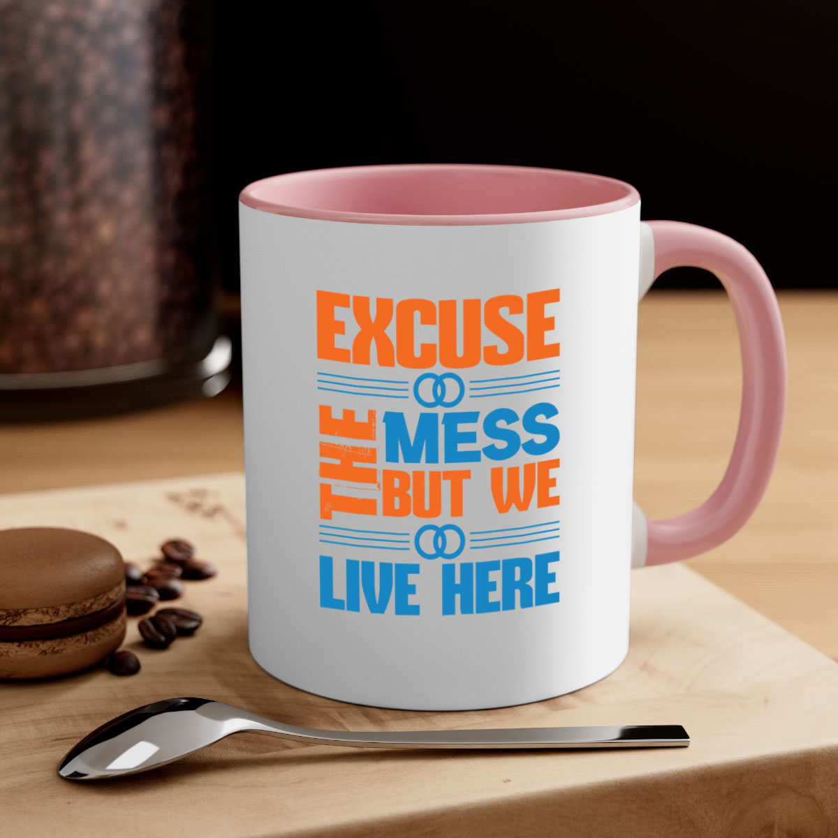 Excuse the Mess But We Live Here Style 33# Mug with colorful handle and glossy finish, available in multiple colors.