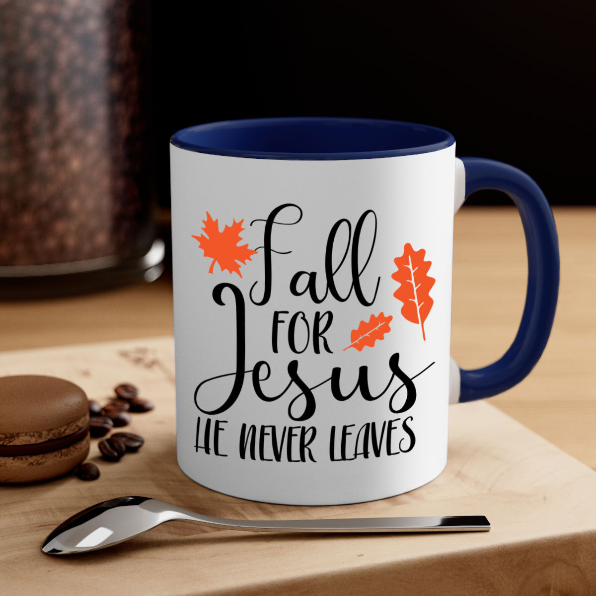 Fall For Jesus He Never Leaves Mug with colorful handle and glossy finish, available in multiple sizes.