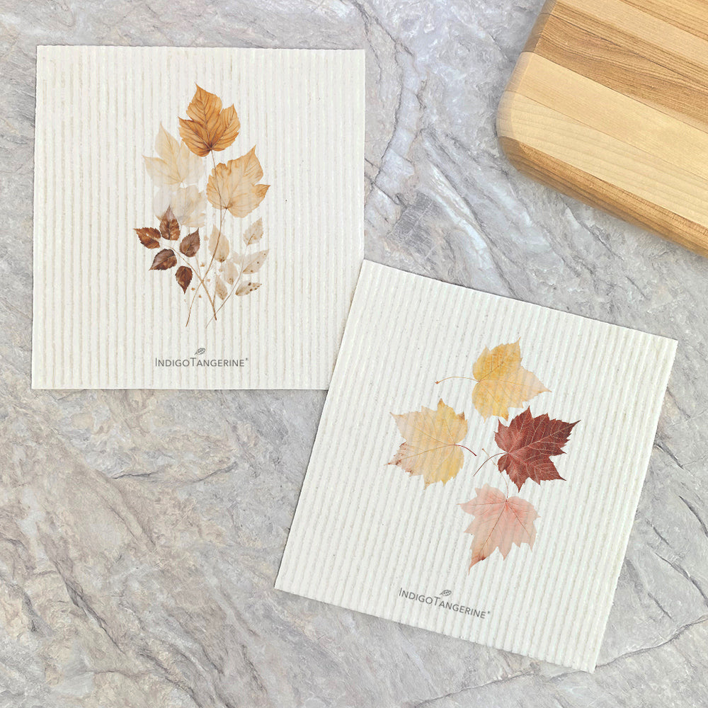 Two Swedish dish cloths featuring fall leaf designs, eco-friendly and compostable.