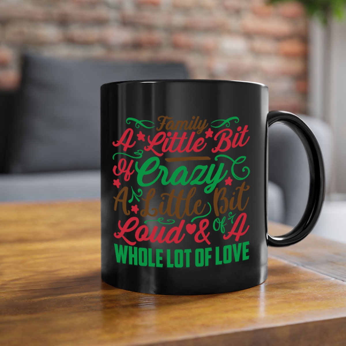 Ceramic mug with colorful handle and interior, featuring the phrase 'A Little Bit of Crazy A Little Bit of Loud A Whole Lot of Love'.