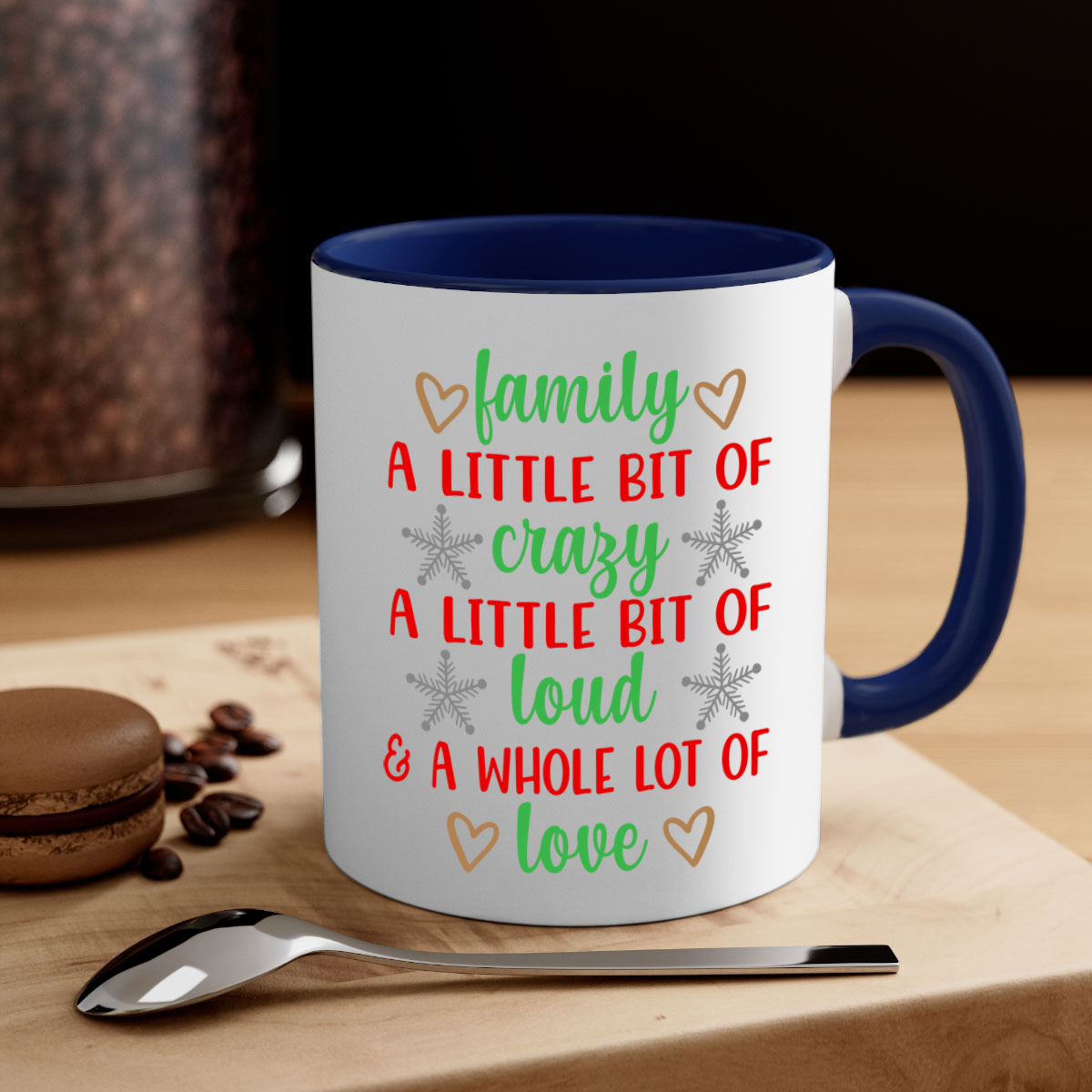 Family A Little Bit of Crazy Christmas Mug with colorful handle and interior, showcasing a glossy finish.