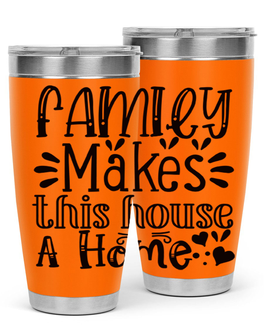 A stylish 20oz stainless steel tumbler with the phrase 'Family Makes This House a Home' printed on it, featuring a drink-thru lid and double wall insulation.