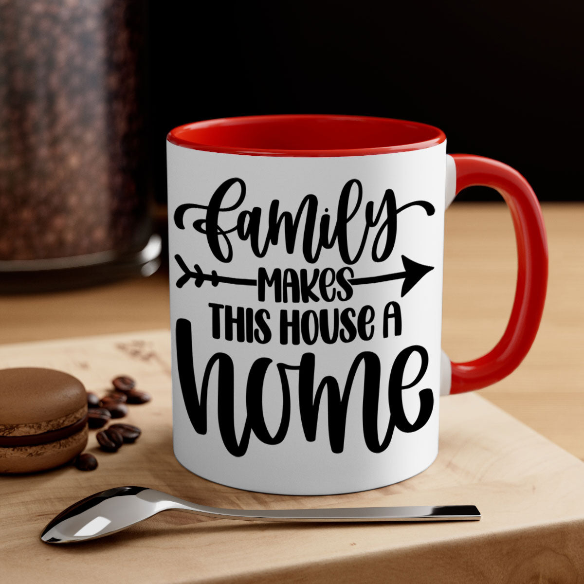 A stylish two-tone ceramic mug with the phrase 'Family Makes This House a Home', featuring a colored handle and glossy finish.