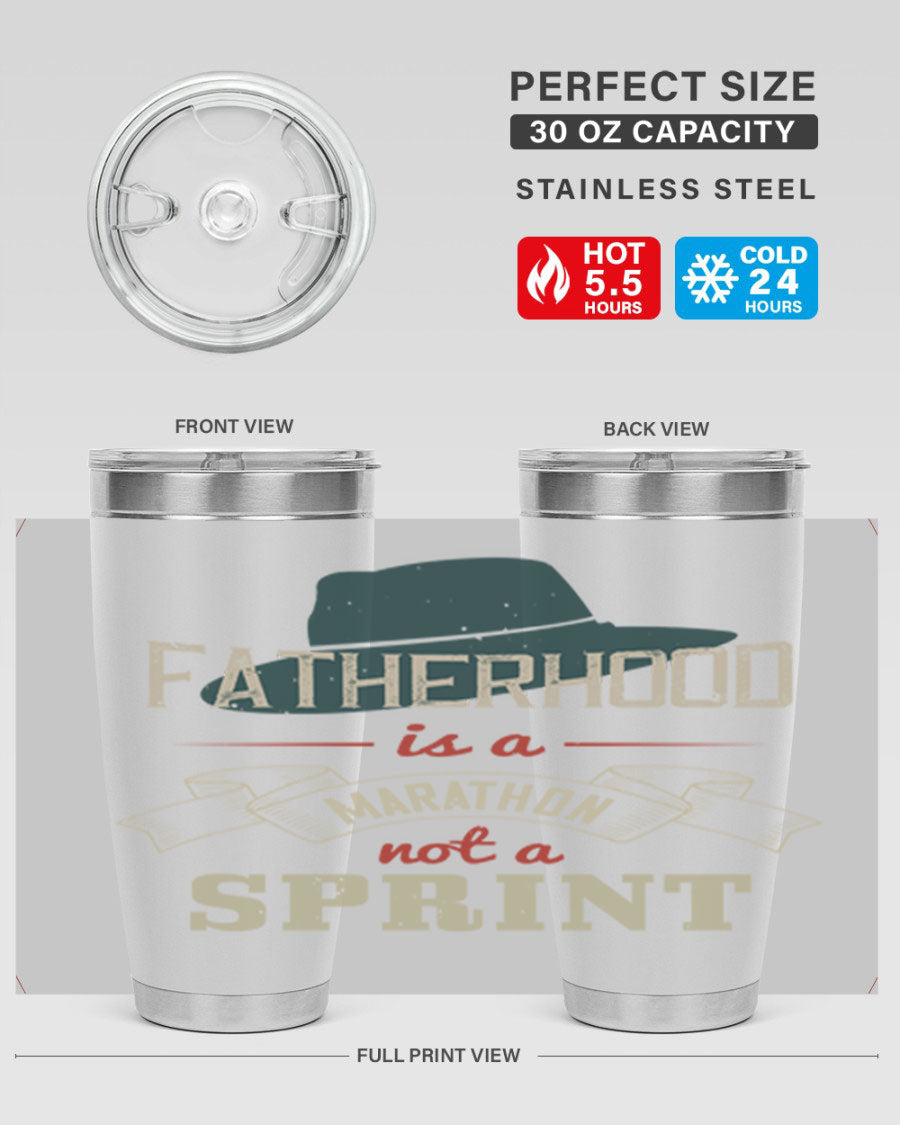 A stylish 'Fatherhood is a Marathon' tumbler in stainless steel, featuring a drink-thru lid and vibrant print, perfect for hot and cold beverages.
