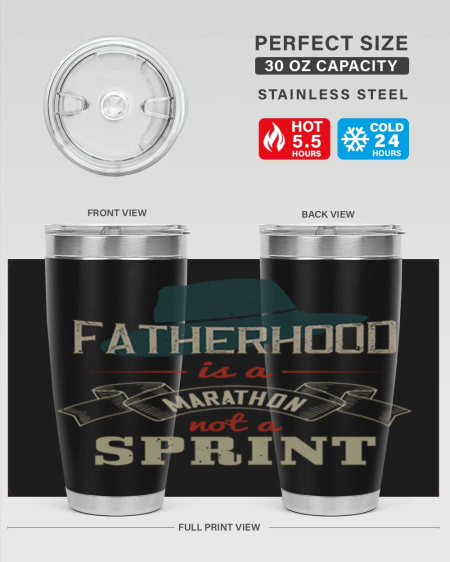 A stylish 'Fatherhood is a Marathon' tumbler in stainless steel, featuring a drink-thru lid and vibrant print, perfect for hot and cold beverages.