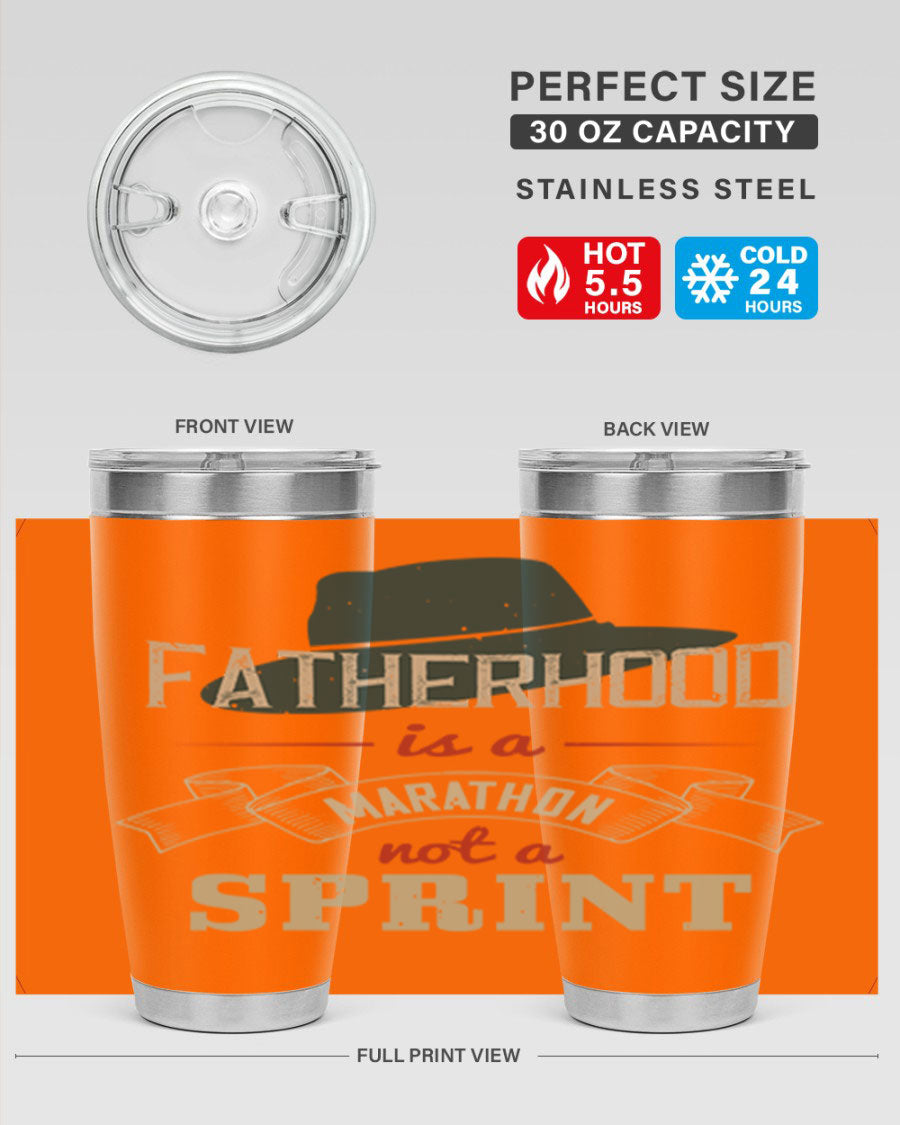 A stylish 'Fatherhood is a Marathon' tumbler in stainless steel, featuring a drink-thru lid and vibrant print, perfect for hot and cold beverages.