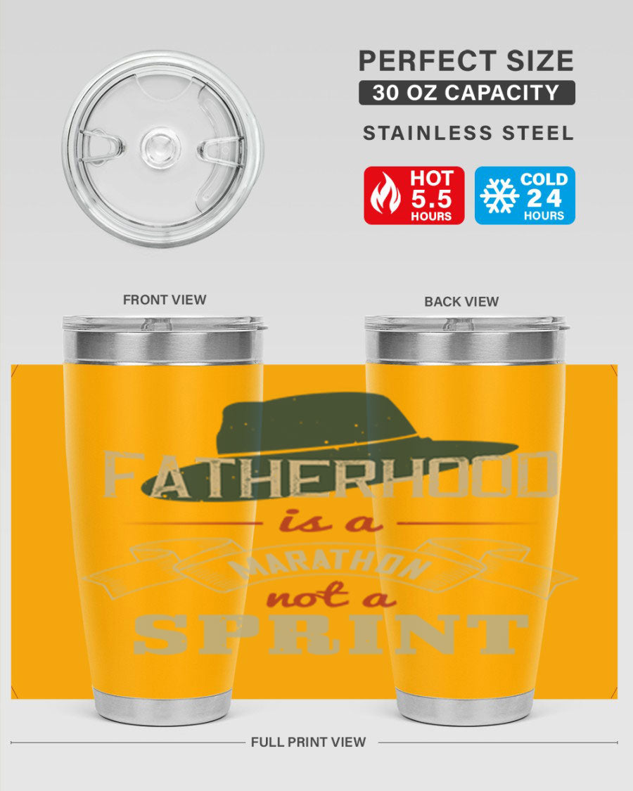 A stylish 'Fatherhood is a Marathon' tumbler in stainless steel, featuring a drink-thru lid and vibrant print, perfect for hot and cold beverages.