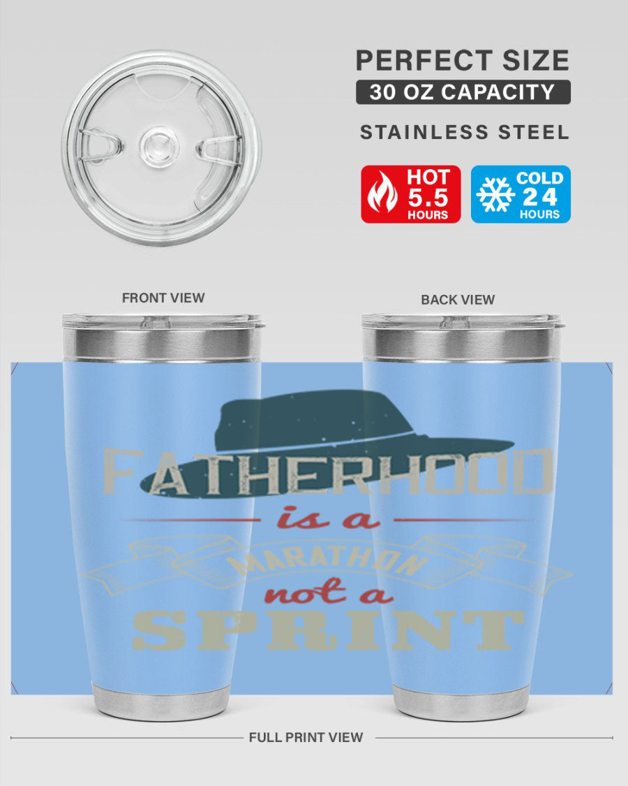A stylish 'Fatherhood is a Marathon' tumbler in stainless steel, featuring a drink-thru lid and vibrant print, perfect for hot and cold beverages.