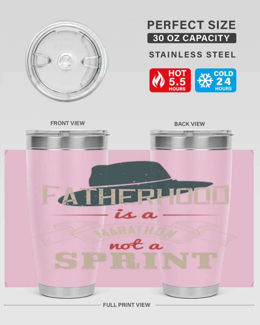 A stylish 'Fatherhood is a Marathon' tumbler in stainless steel, featuring a drink-thru lid and vibrant print, perfect for hot and cold beverages.