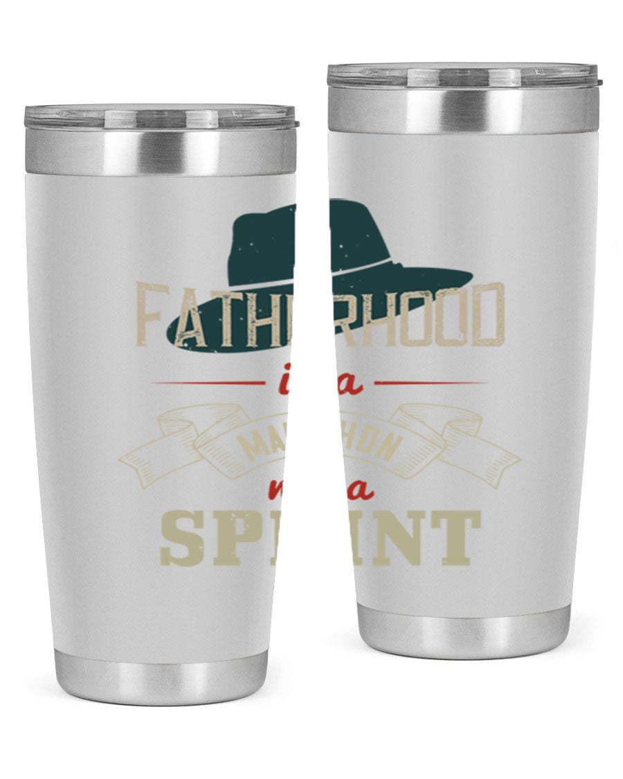 A stylish 'Fatherhood is a Marathon' tumbler in stainless steel, featuring a drink-thru lid and vibrant print, perfect for hot and cold beverages.