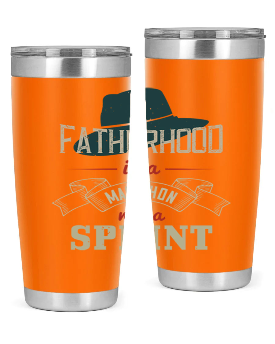 A stylish 'Fatherhood is a Marathon' tumbler in stainless steel, featuring a drink-thru lid and vibrant print, perfect for hot and cold beverages.