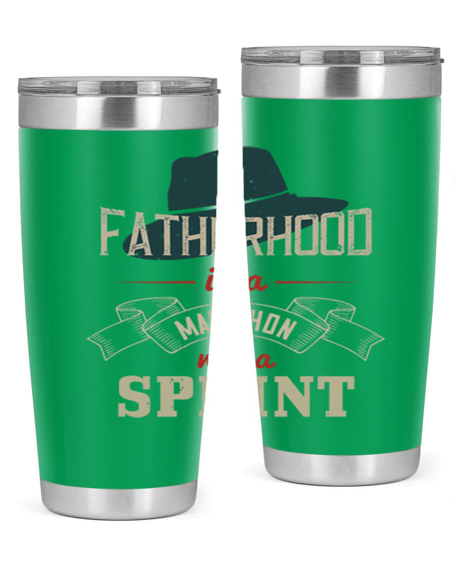 A stylish 'Fatherhood is a Marathon' tumbler in stainless steel, featuring a drink-thru lid and vibrant print, perfect for hot and cold beverages.
