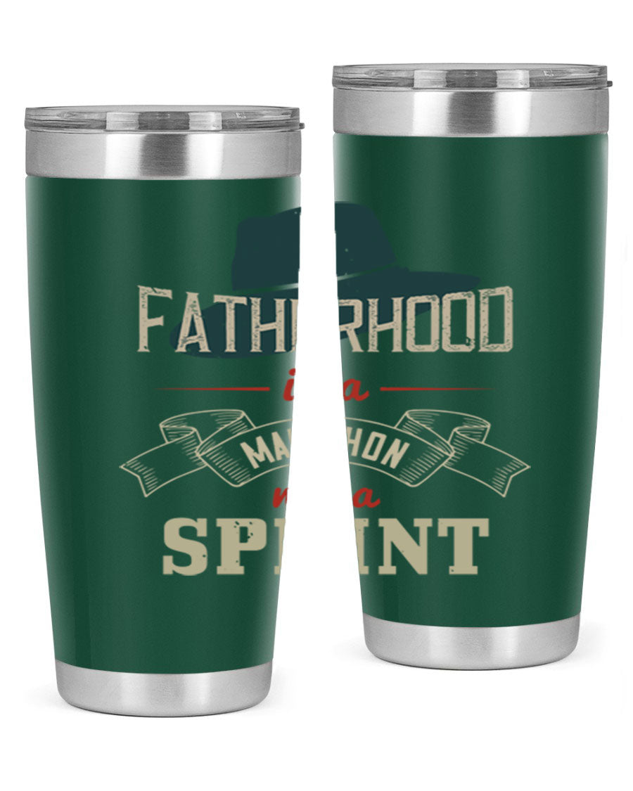 A stylish 'Fatherhood is a Marathon' tumbler in stainless steel, featuring a drink-thru lid and vibrant print, perfect for hot and cold beverages.