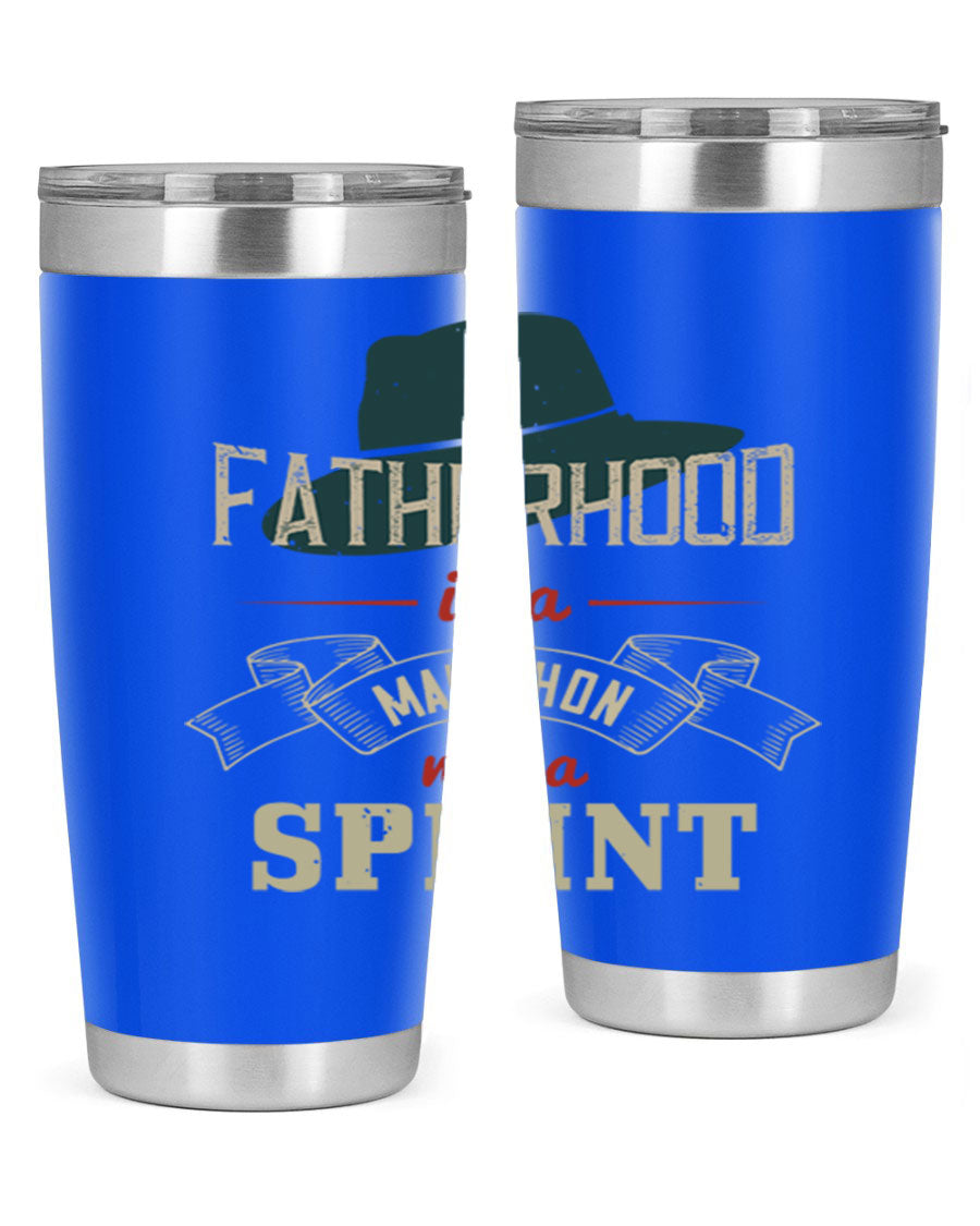 A stylish 'Fatherhood is a Marathon' tumbler in stainless steel, featuring a drink-thru lid and vibrant print, perfect for hot and cold beverages.