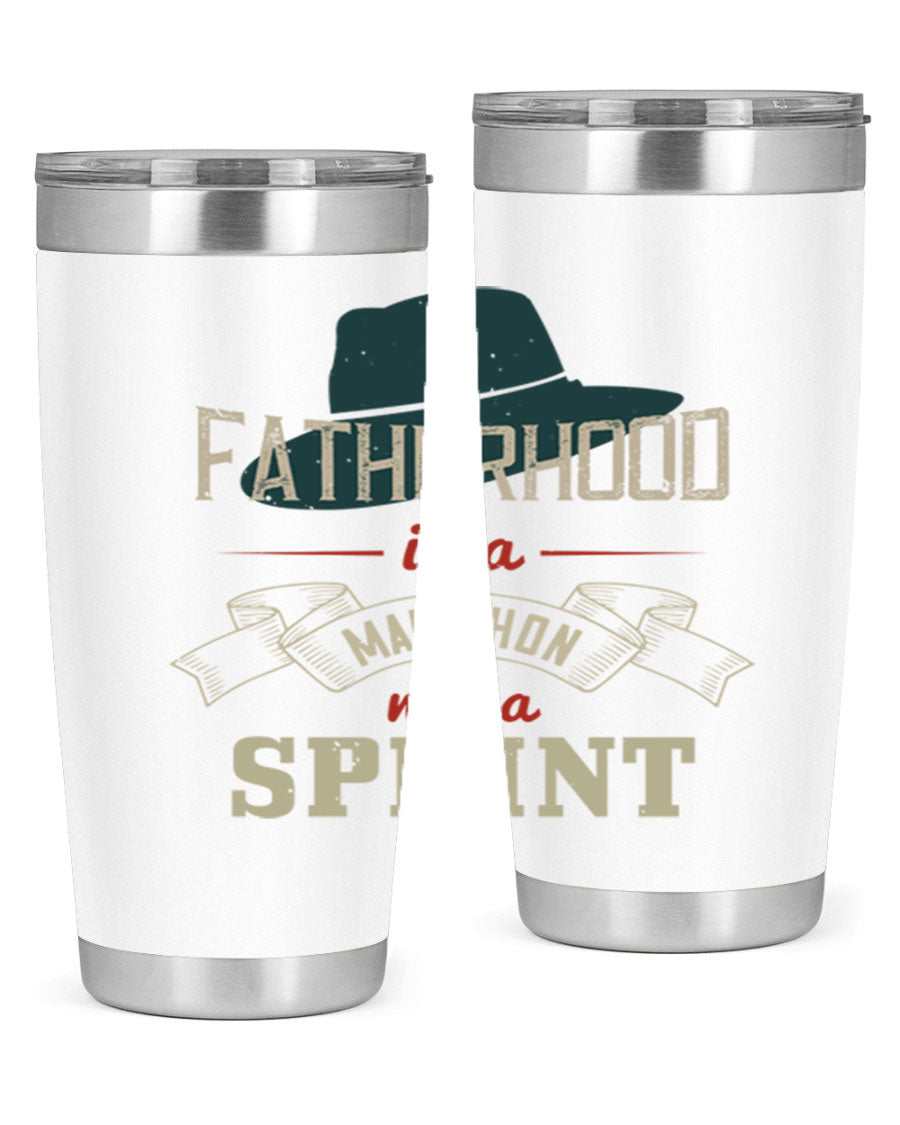 A stylish 'Fatherhood is a Marathon' tumbler in stainless steel, featuring a drink-thru lid and vibrant print, perfect for hot and cold beverages.