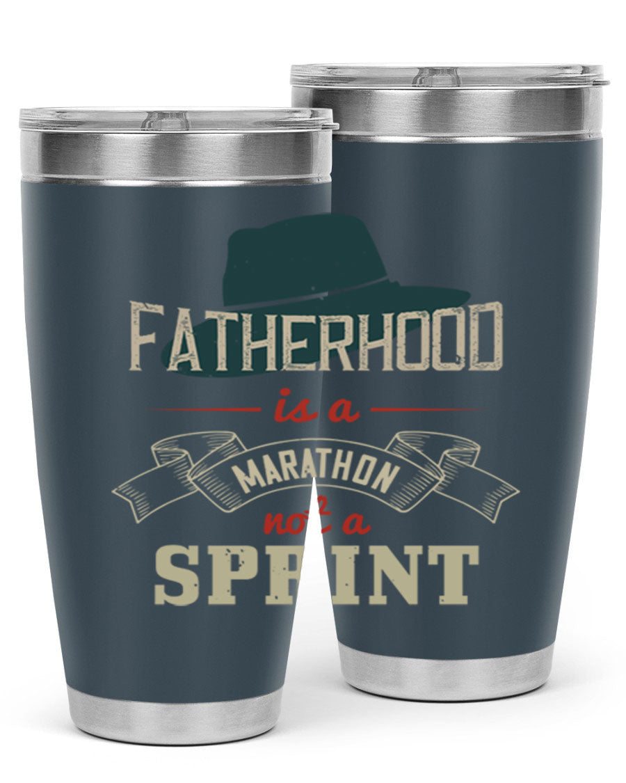 A stylish 'Fatherhood is a Marathon' tumbler in stainless steel, featuring a drink-thru lid and vibrant print, perfect for hot and cold beverages.