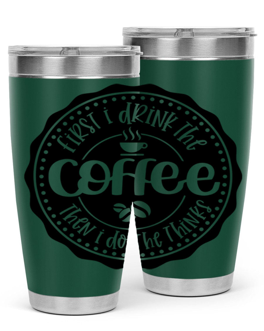 A stylish stainless steel tumbler with the phrase 'First I Drink the Coffee Then I Do the Thinks', featuring a double wall vacuum design.