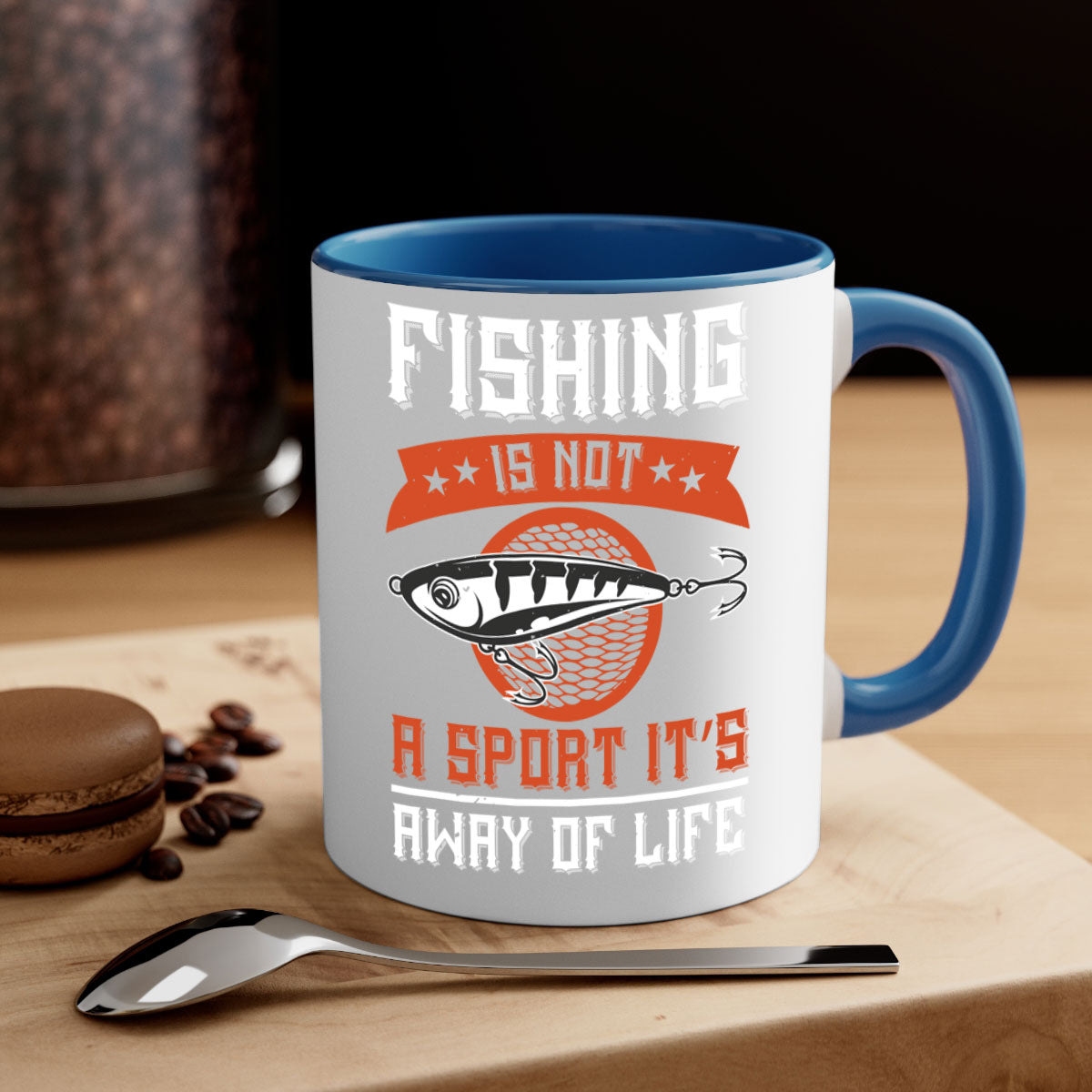 A two-tone ceramic coffee mug featuring the phrase 'Fishing is Not a Sport, It’s a Way of Life' with a glossy finish and colored handle.