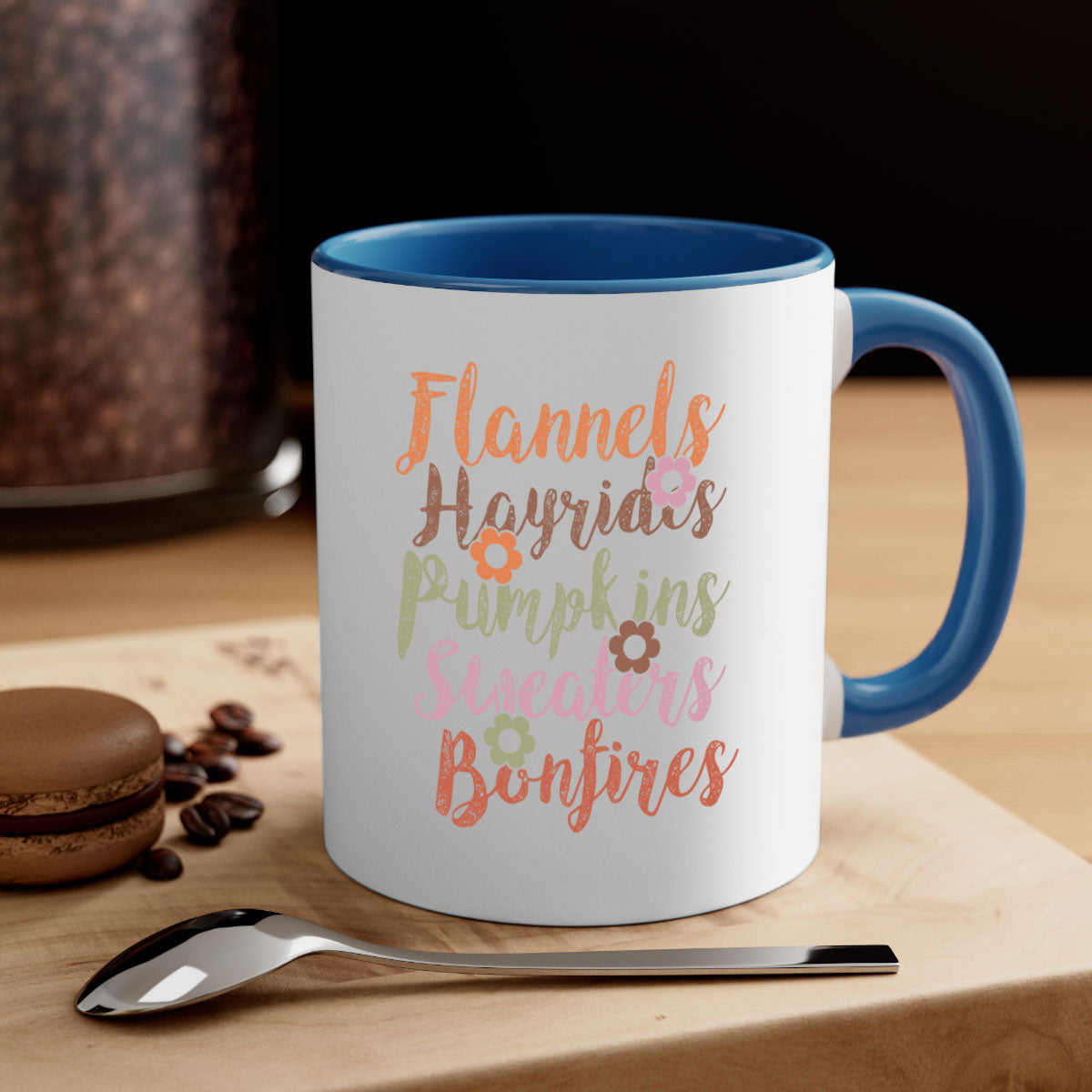 Flannels Hayrides Pumpkins Sweaters Bonfires Mug with colorful handle and glossy finish, perfect for fall beverages.