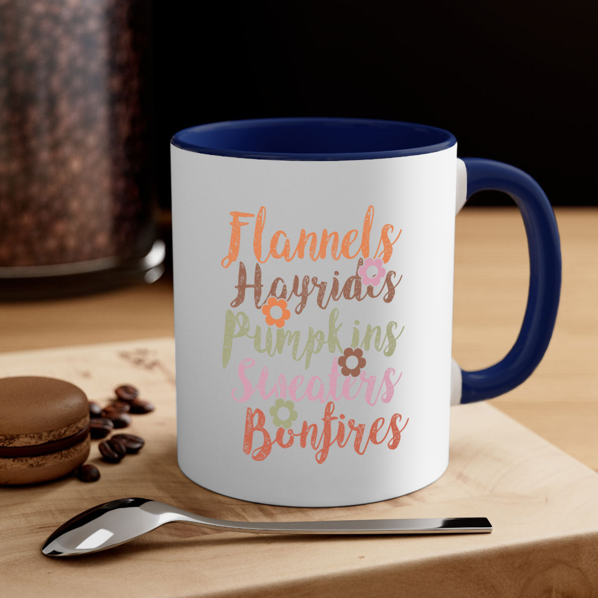 Flannels Hayrides Pumpkins Sweaters Bonfires Mug with colorful handle and glossy finish, perfect for fall beverages.